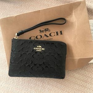 Debossed Patent Leather Corner Zip Wristlet